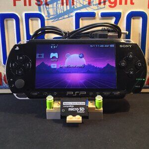 Sony PSP 1003 with Charger, Memory Stick, & Games